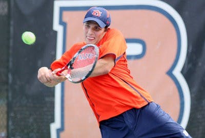 Freshman Raphael Rondino returns a serve Saturday as No. 26 Auburn upsets No. 14 Kentucky 4-1. (Emily Adams / Photo Editor)