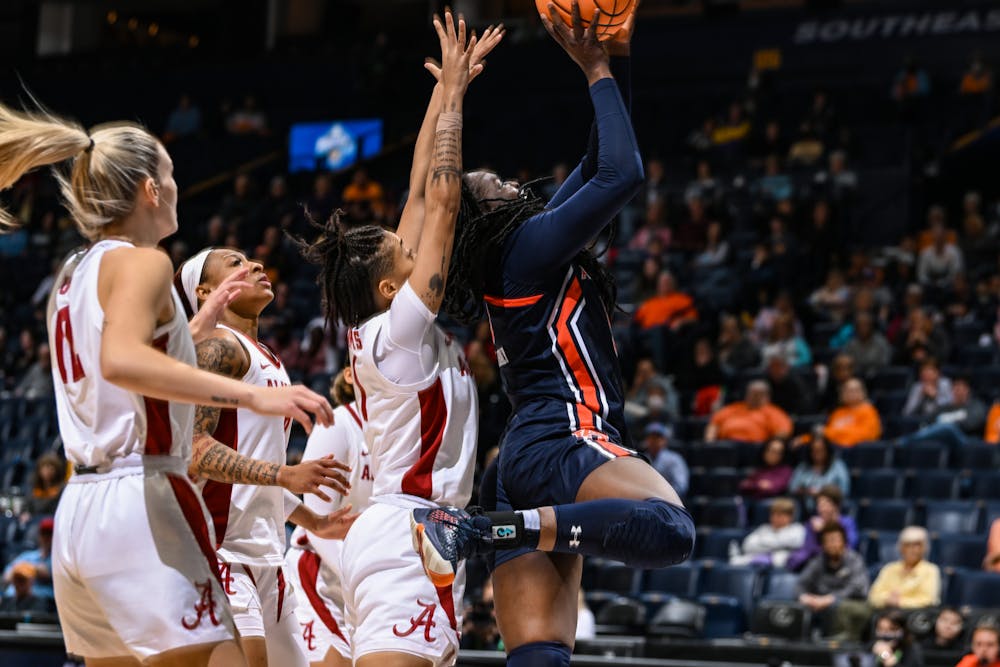 Aicha Coulibaly (5) goes up for a shot during the gameAuburn v AlabamaSEC Women’s Basketball Tournament on  Wednesday, March 2, 2022 in Nashville, TN.Todd Van Emst/SEC