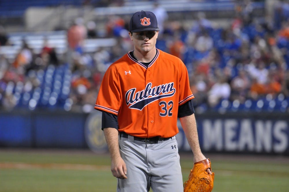 Casey Mize walks off the field&nbsp;during Auburn Baseball vs. Texas A&M on Thursday,&nbsp;May 24, 2018 in Hoover, Ala.