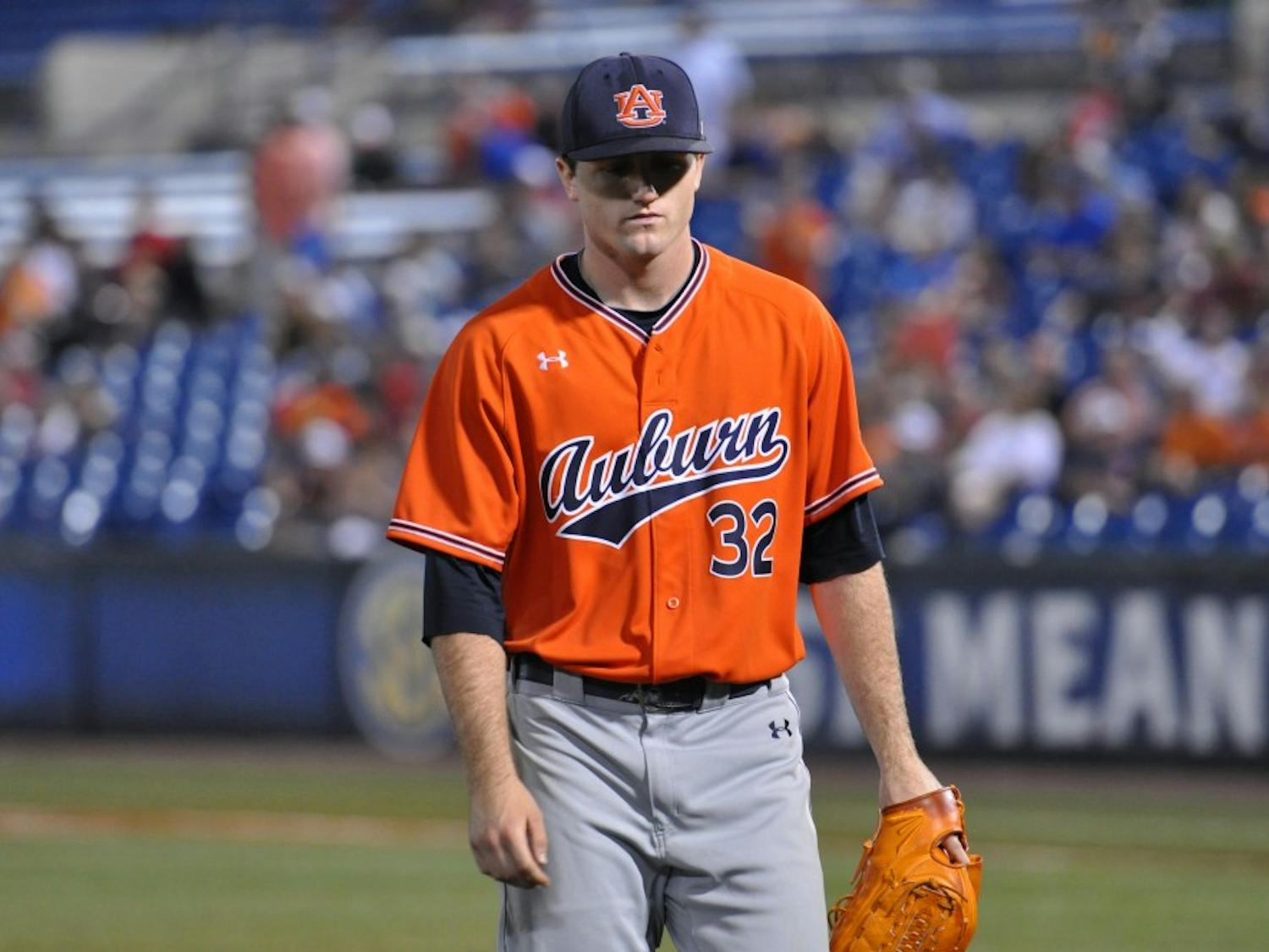 Casey Mize walks off the field during Auburn Baseball vs. Texas A&M on Thursday, May 24, 2018 in Hoover, Ala.