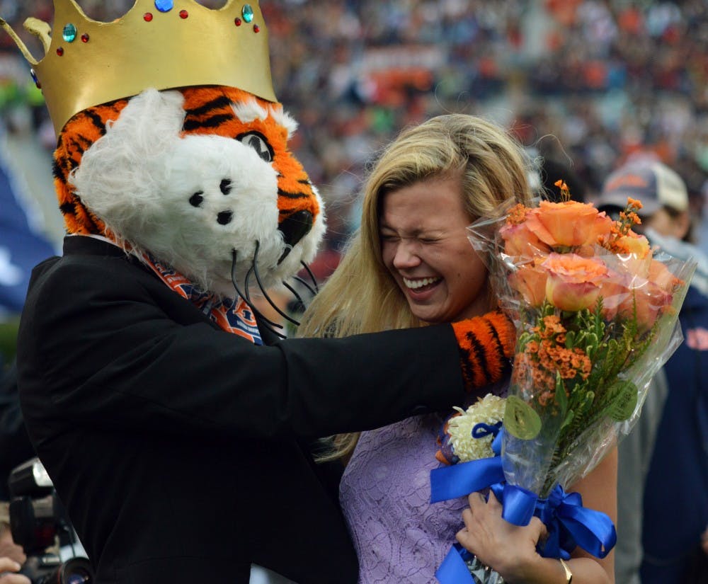 Taylor Wesley hugs Aubie after being named Miss Homecoming. San Jose State at Auburn on Oct. 3.