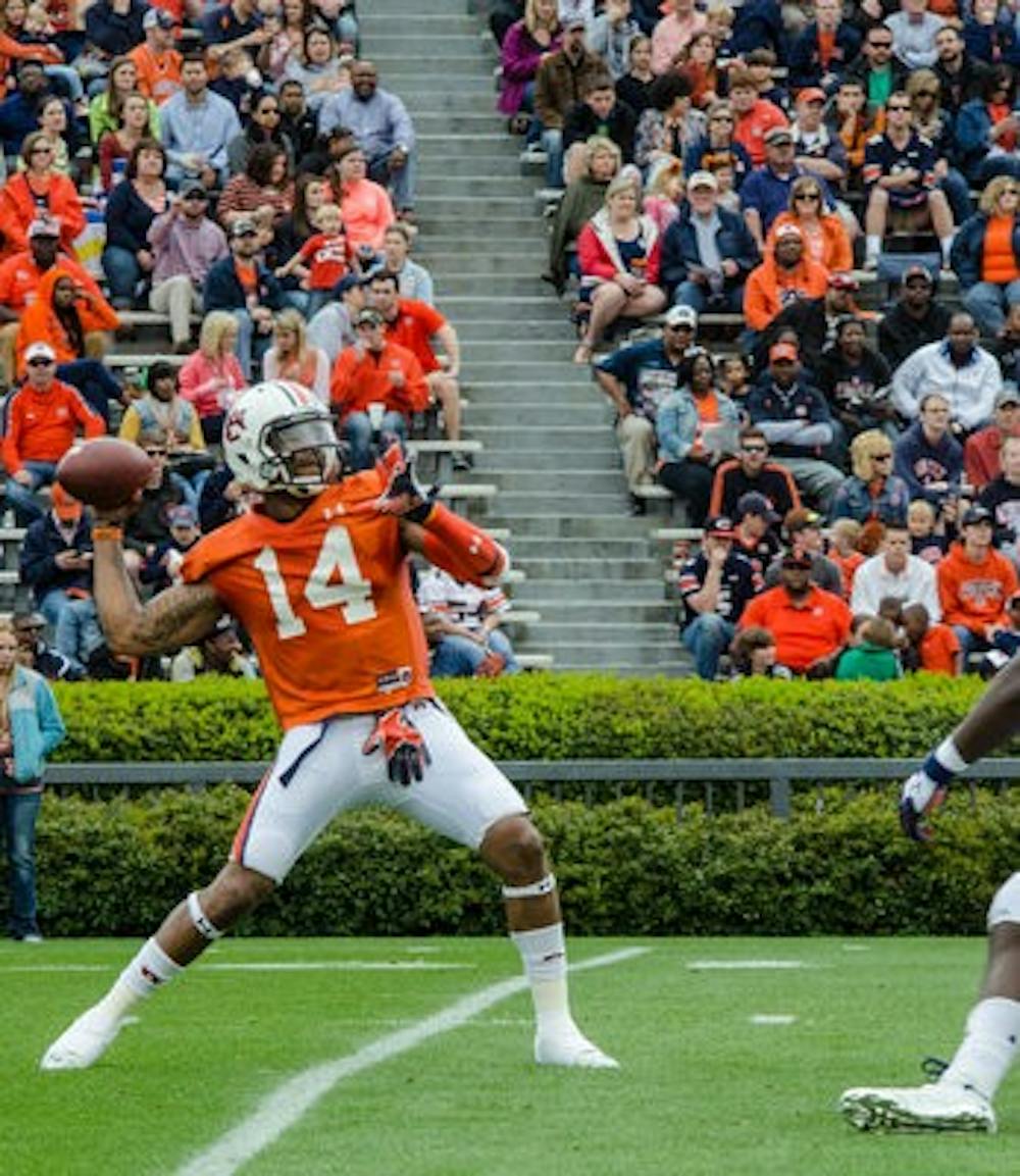 Quarterback Nick Marshall throws a pass during Saturday's A-Day game at Jordan-Hare Stadium.