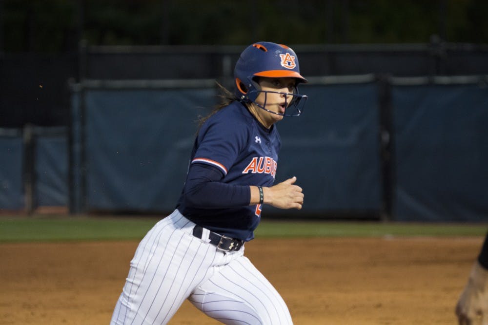 Auburn Tiger Kendall Veach (24) rounds third base vs. Kennesaw State University on April 4, 2018, in Auburn, Ala.