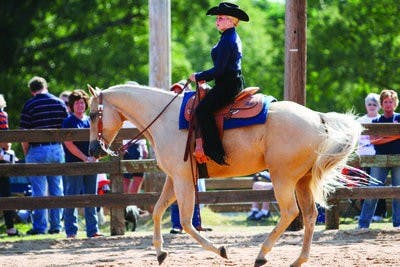 Freshman western rider Bailee Bussey competes in western against South Carolina. (Rebecca Croomes / ASSISTANT PHOTO EDITOR)