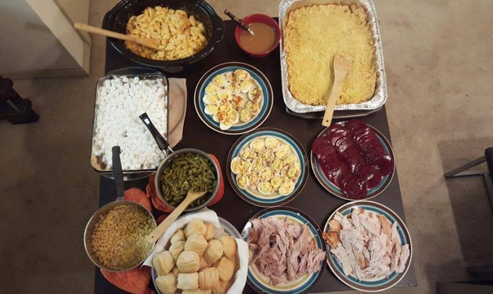 <p>A meal prepared by Jonathan Corona, senior in community planning and Friendsgiving host, awaits guests.&nbsp;</p>
