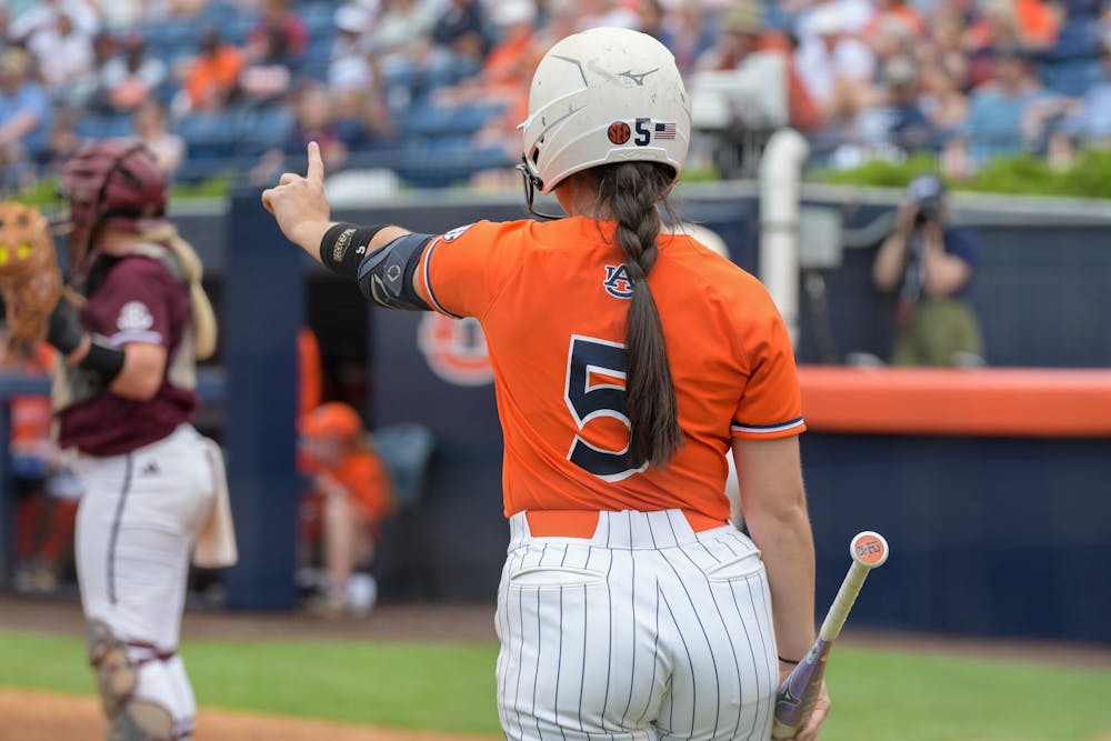 Auburn softball comes up just short, falls in extra innings The