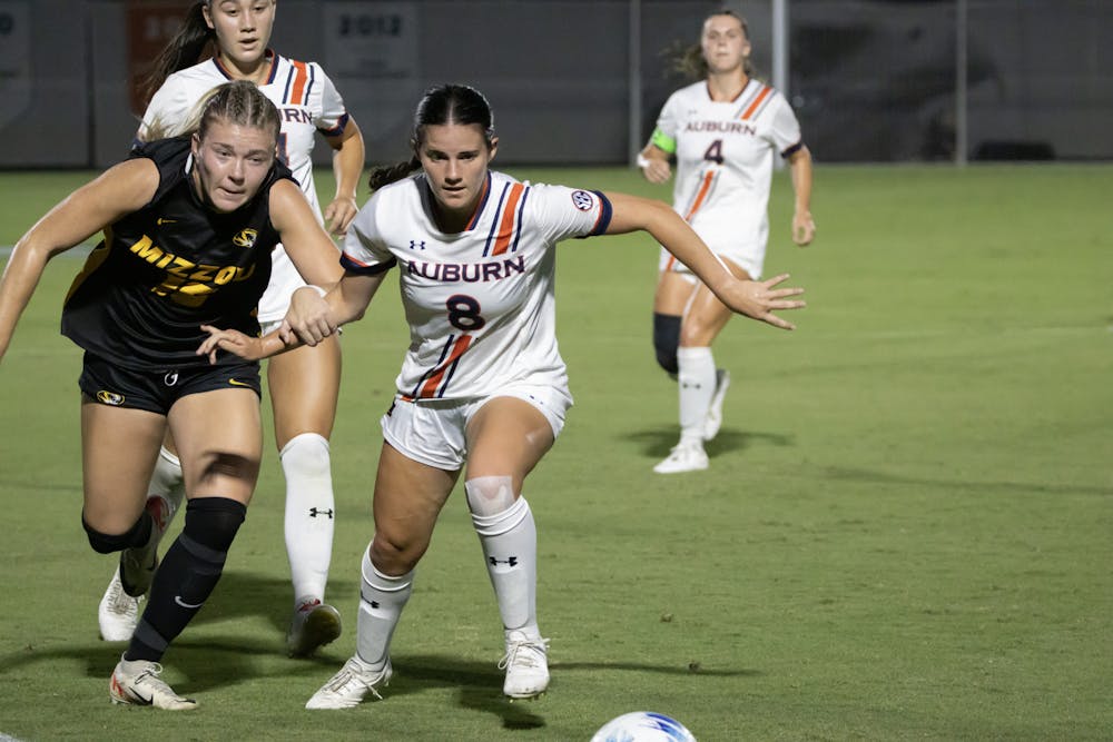 Mallory Mooney (#8) competes with a Missouri player to gain control of the ball at the Auburn Soccer Complex on Sept. 21, 2023.