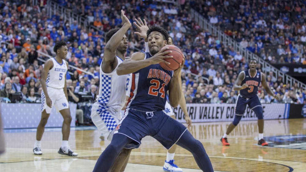 <p>Anfernee McLemore (24) makes a move in the post during Auburn basketball vs. Kentucky in the Midwest Regional Final of the 2019 NCAA Tournament on March 31, 2019, in Kansas City, Mo. Photo courtesy Lauren Talkington / The Glomerata.</p>
