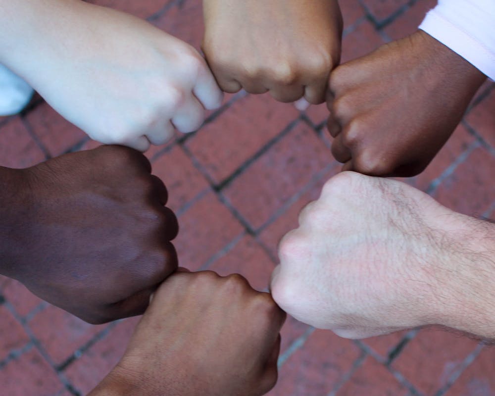 Auburn students put fist together at Samford Hall on September 29th, 2023.