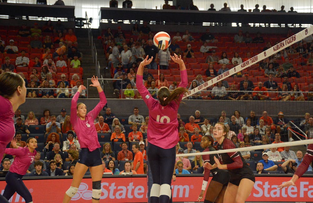 Jackie Barrett sets the ball during the Auburn v South Carolina volleyball game at Neville Arena on 10/22/23.