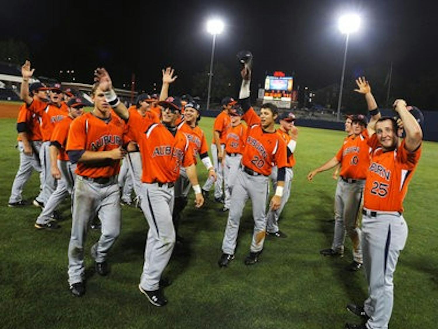Auburn celebrates its 18-4 win over Ole Miss after winning the SEC West May 21, 2010. (Todd van emst / media relations)