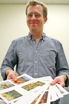 Chandler White works at the self-service CopyCat in the Student Center. He is leaving Auburn to continue his education in the fall. (Rebecca Croomes / PHOTO EDITOR)