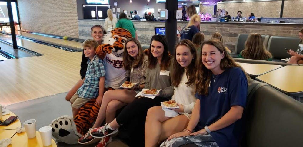 <p>Delta Zeta sorority members of the team "Hollis's Heart Throbs" pose for a pic with Aubie at GoodTimes Bowling on Sep. 27, 2018 in Auburn, Ala. The team backed seven year-old Hollis Yuan, who was born with CDH and spent 6 months in NICU at Children's Hospital in Birmingham, Ala.</p>