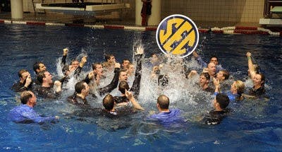 The Auburn men celebrate winning their 14th straight SEC Swimming and Diving Championship Saturday.SEC Swimming and Diving Championships in Athens, GA.,  on Saturday, Feb. 20, 2010. day 4 FINALSTodd Van Emst