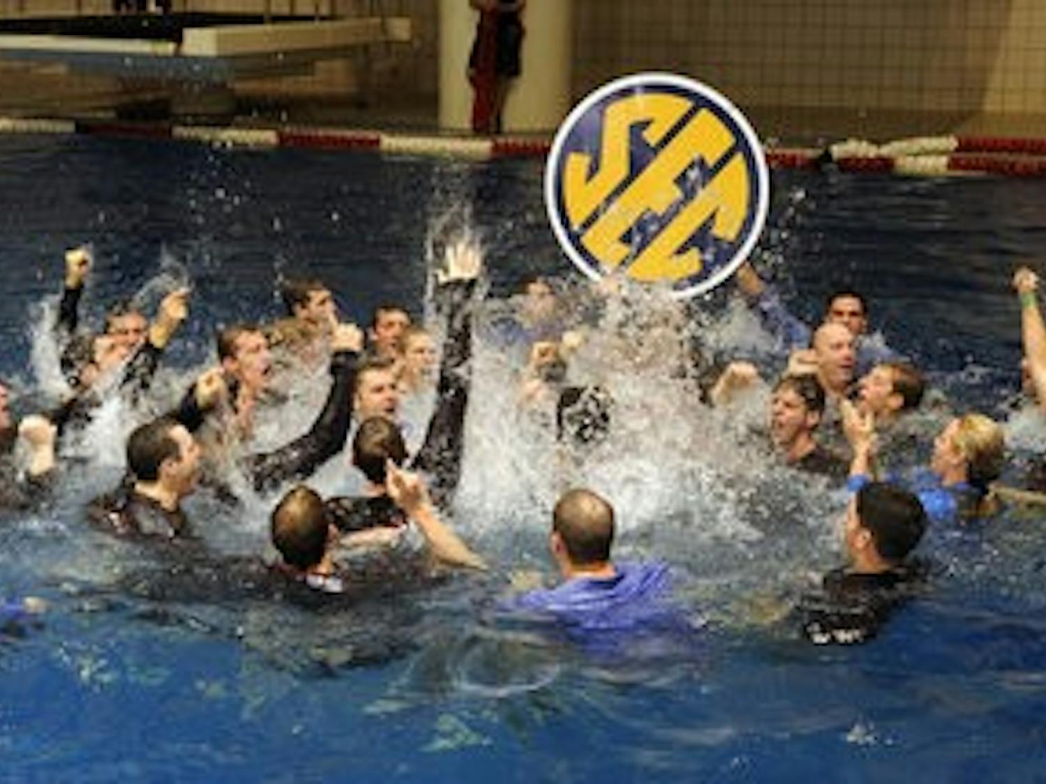 The Auburn men celebrate winning their 14th straight SEC Swimming and Diving Championship Saturday.SEC Swimming and Diving Championships in Athens, GA.,  on Saturday, Feb. 20, 2010. day 4 FINALSTodd Van Emst