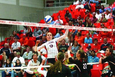 Sophomore middle blocker Camila Jersonsky prepares to spike against USC. (Rebecca Croomes / ASSISTANT PHOTO EDITOR)
