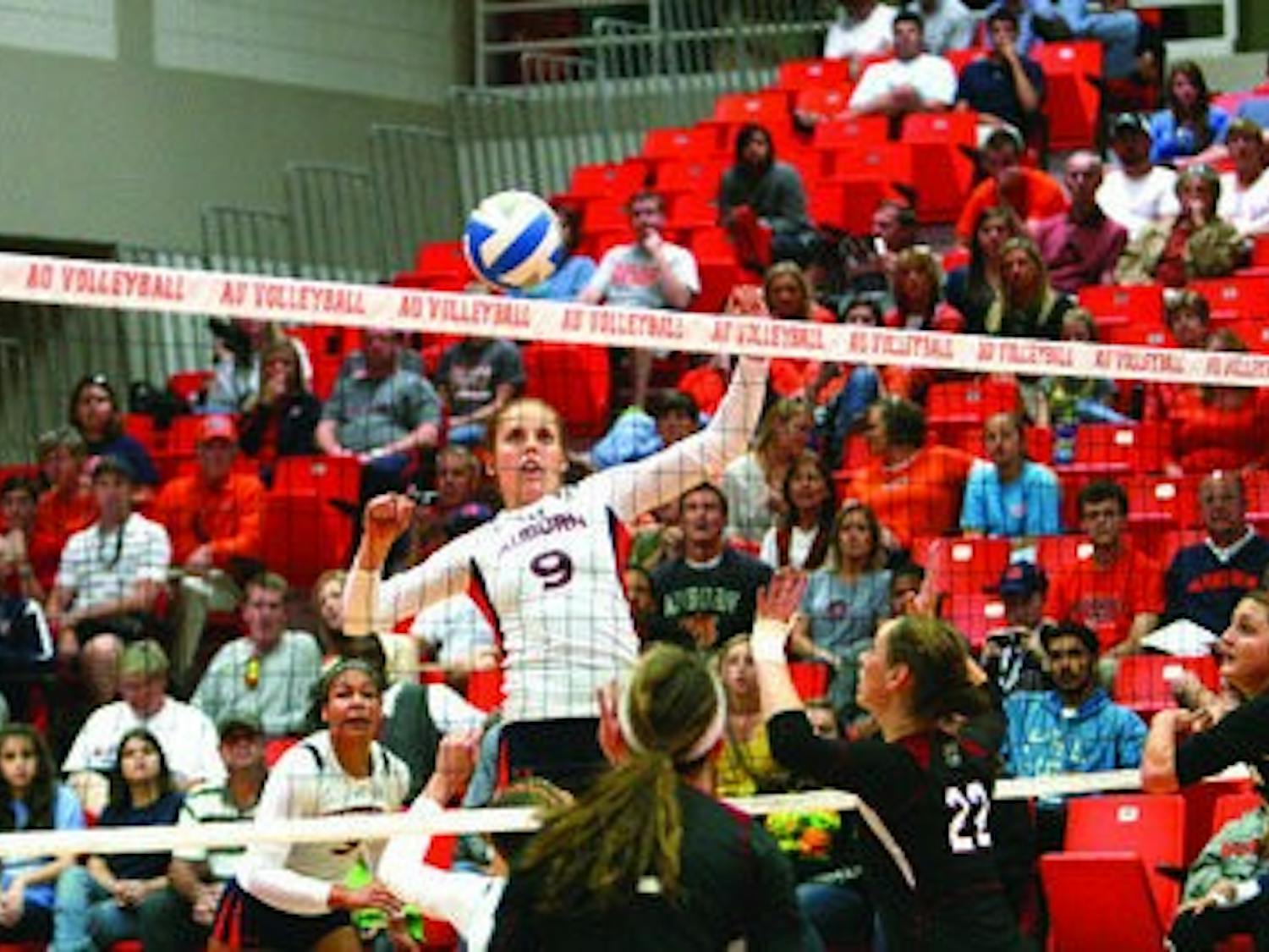 Sophomore middle blocker Camila Jersonsky prepares to spike against USC. (Rebecca Croomes / ASSISTANT PHOTO EDITOR)