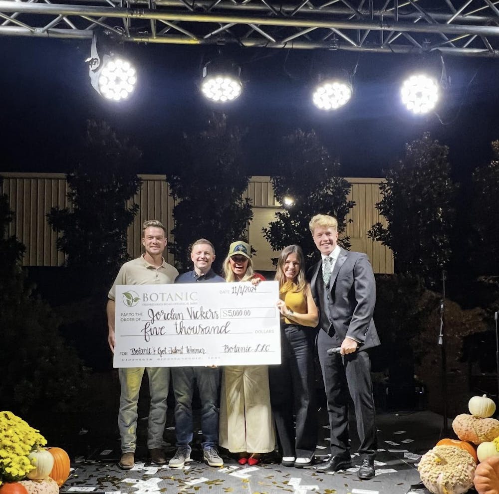 <p>Botanic's Got Talent season three winner, Jordan Vickers, receiving his check prize on Nov. 1, 2024. Photo contributed by Carson Evans.</p>
