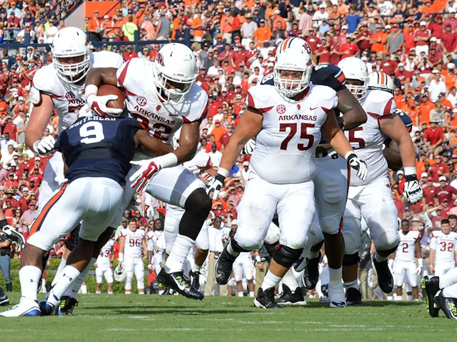 Jermaine Whitehead (#9) blocks. Auburn vs. Arkansas, August 30, 2014. (Emily Enfinger | Assistant Photo Editor)