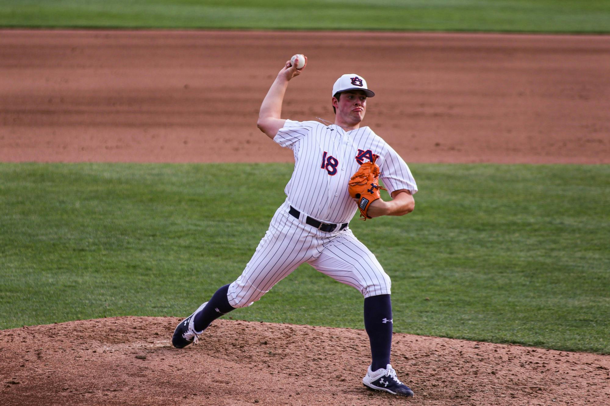 031321_Auburn_IMG_4617_Mason Barnett pitches the ball .jpg