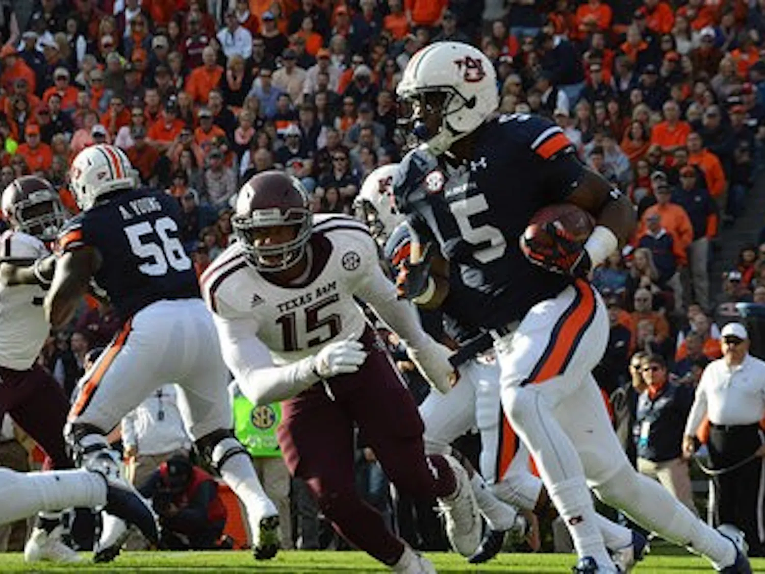 Ricardo Louis #5 runs with ball. Texas A&M's vs. Auburn at Auburn, Ala. on Nov 8, 2014. (Emily Enfinger | Assistant Photo Editor)
