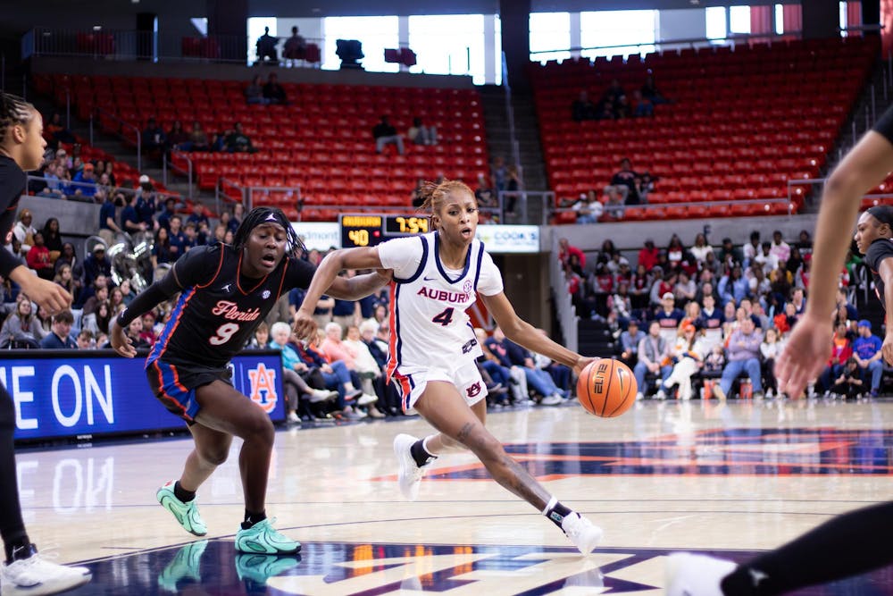 <p>Kaitlyn Duhon makes a move toward the basket past Florida's defense during the game on Jan 11, 2026 at Neville Arena in Auburn, Ala. </p>