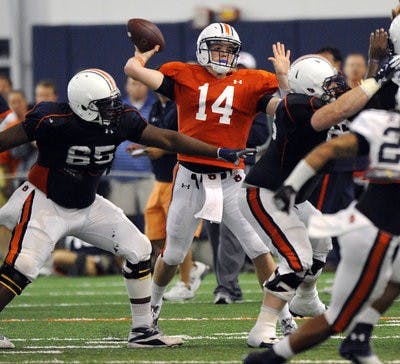 Auburn's Zeke Pike makes a throw in the team's first scrimmage of the spring. (Courtesy of Todd Van Emst)