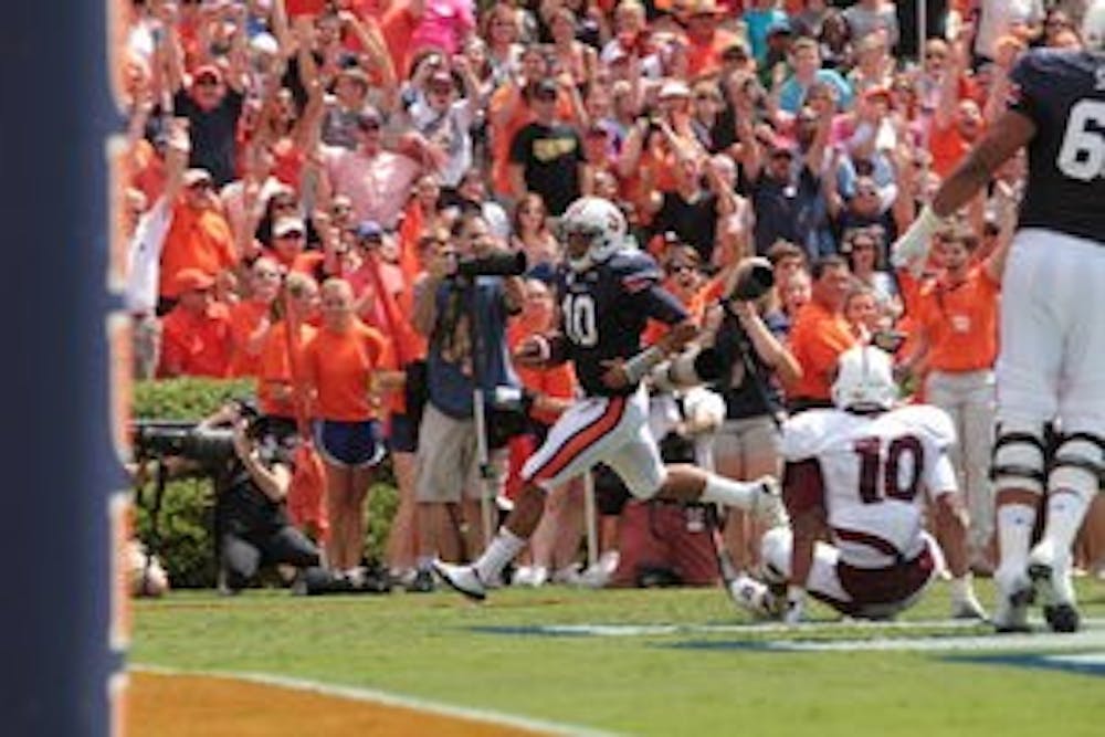 Frazier defused some of the criticism with his two touchdown performance in a win over University of Louisiana at Monroe. The sophomore went 10 of 18 for 130 yards, a touchdown and an interception and also caught a 33-yard touchdown pass. (Emily Morris / ASSISTANT PHOTO EDITOR)