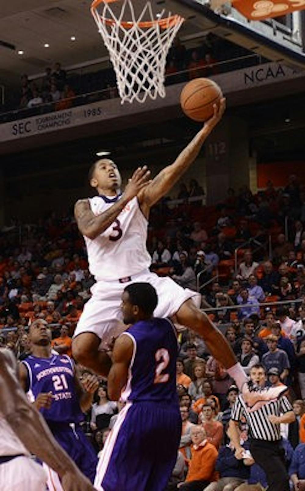 Auburn's Chris Denson goes for a layup against Northwestern State. (Contributed by Todd Van Emst)
