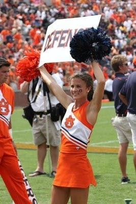Caroline Dunklin, junior cheerleader, shows spirit during a home football game. (CONTRIBUTED)