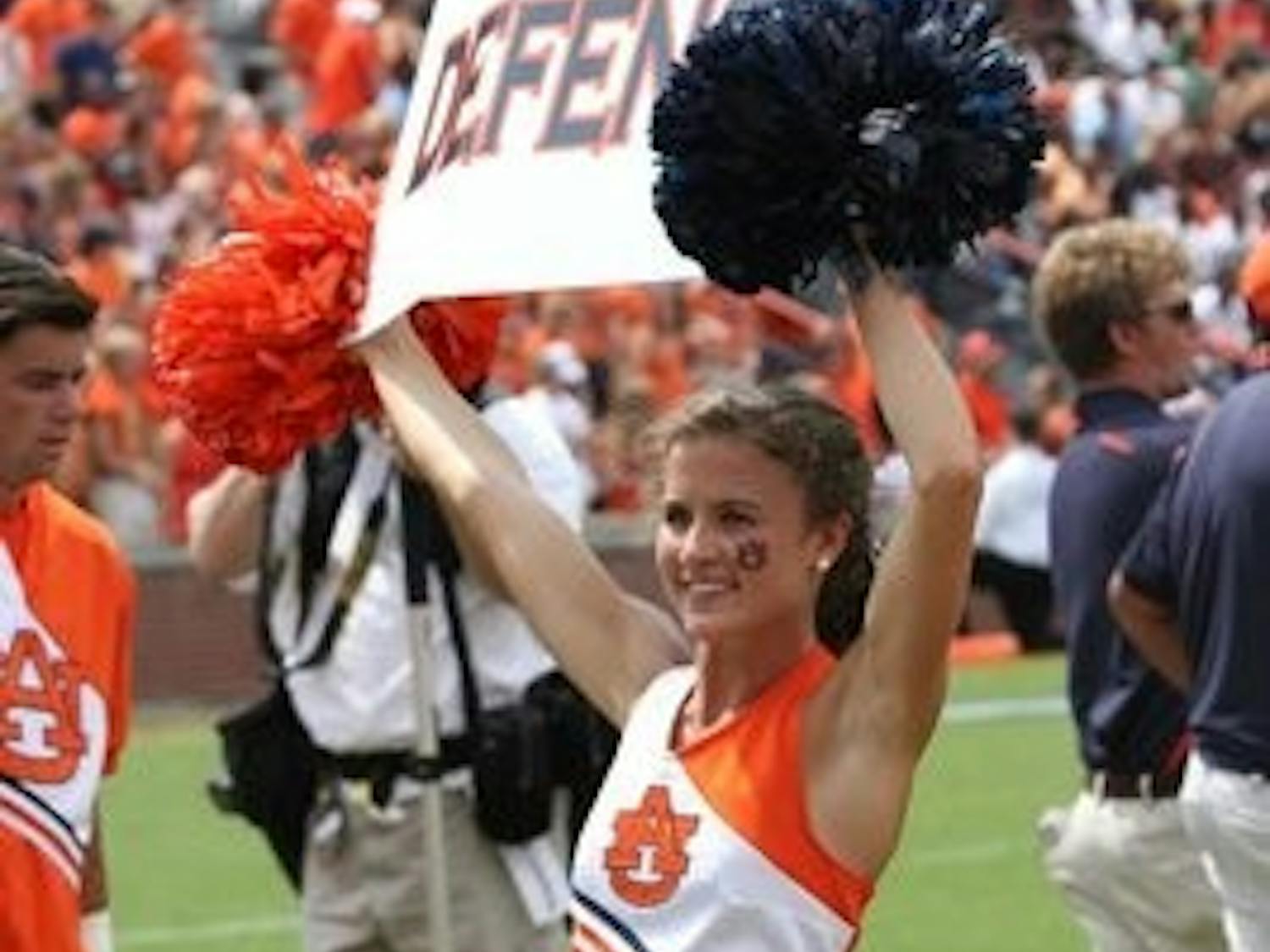 Caroline Dunklin, junior cheerleader, shows spirit during a home football game. (CONTRIBUTED)