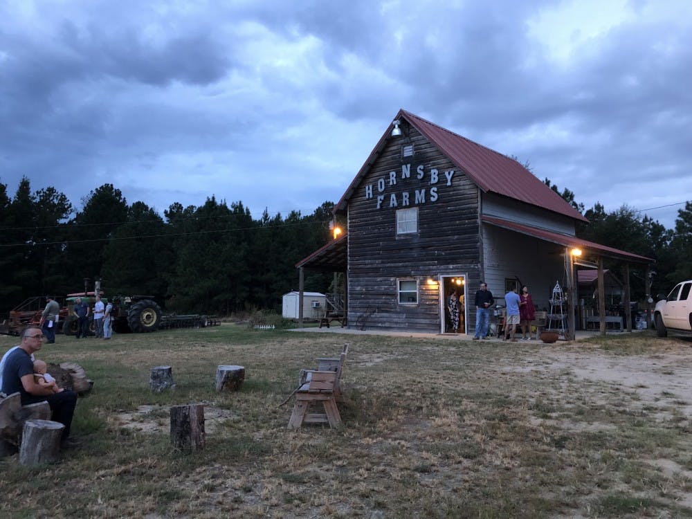 <p>Family Supper is held at Hornsby Farms on Sept. 24, 2018, &nbsp;in Auburn, Ala.</p>