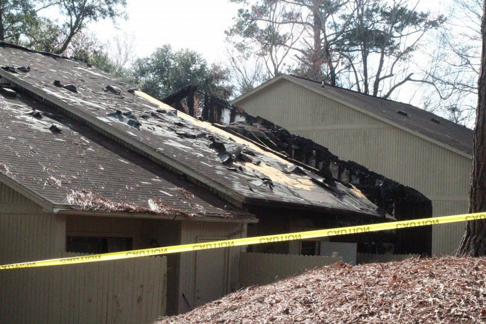 <p>Burn damage to the apartment at the scene of the Crossland Downs shooting and fire on Feb. 16, 2019, in Auburn, Ala.</p>