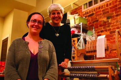 Cary Curtiss, left, owns and operates Yarnhouse Studio in downtown Opelika with her mother Anne Sockwell. The studio hosts classes and workshops while supplying locals with yarn in every color imaginable. (Rebecca Croomes / PHOTO EDITOR)