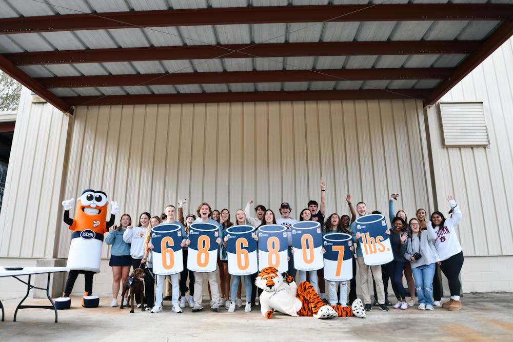 <p>Members of the Beat Bama Food Drive stand for a photo following end of the Fall 2023 drive.&nbsp;</p>