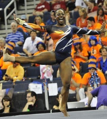 Auburn's Bri Guy scores a 9.90 on the floor at the 2012 SEC Gymnastics Championship in Duluth, Ga., March 24. Guy earned second team All-SEC honors for her performance this season. (Photo Courtesy of Anthony Hall)