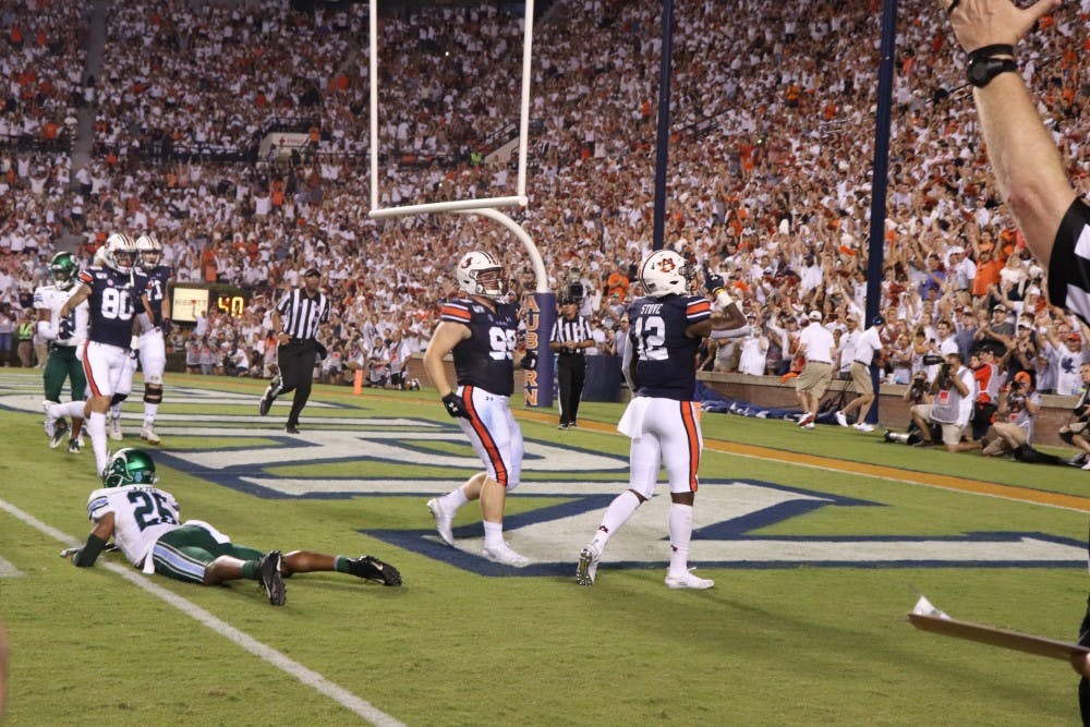 Eli Stove (12) celebrating after making a touchdown during Auburn Football vs. Tulane on Sep. 7, 2019, in Auburn, Ala.