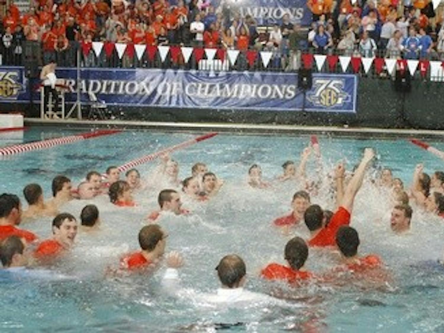 The Auburn mens and womens swimming and diving teams celebrate winning the SEC Swimming and Diving Championships. Auburn coach Richard Quick is center.
Auburn SEC Swimming Finals on Saturday, Feb. 25, 2008 in Tuscaloosa, Ala.. 
Todd Van Emst