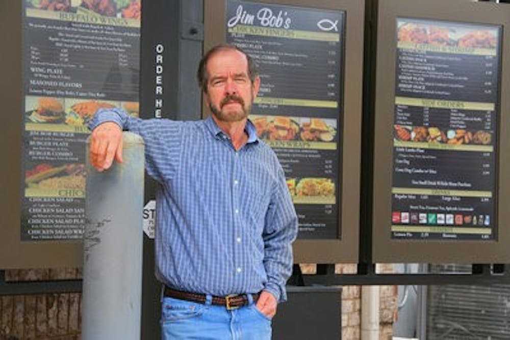Owner of Jim Bob's, Chuck Ferrell, stands in front of the new drive-thru of the Tiger Town location. (Rebekah Weaver / Assistant Photo Editor)