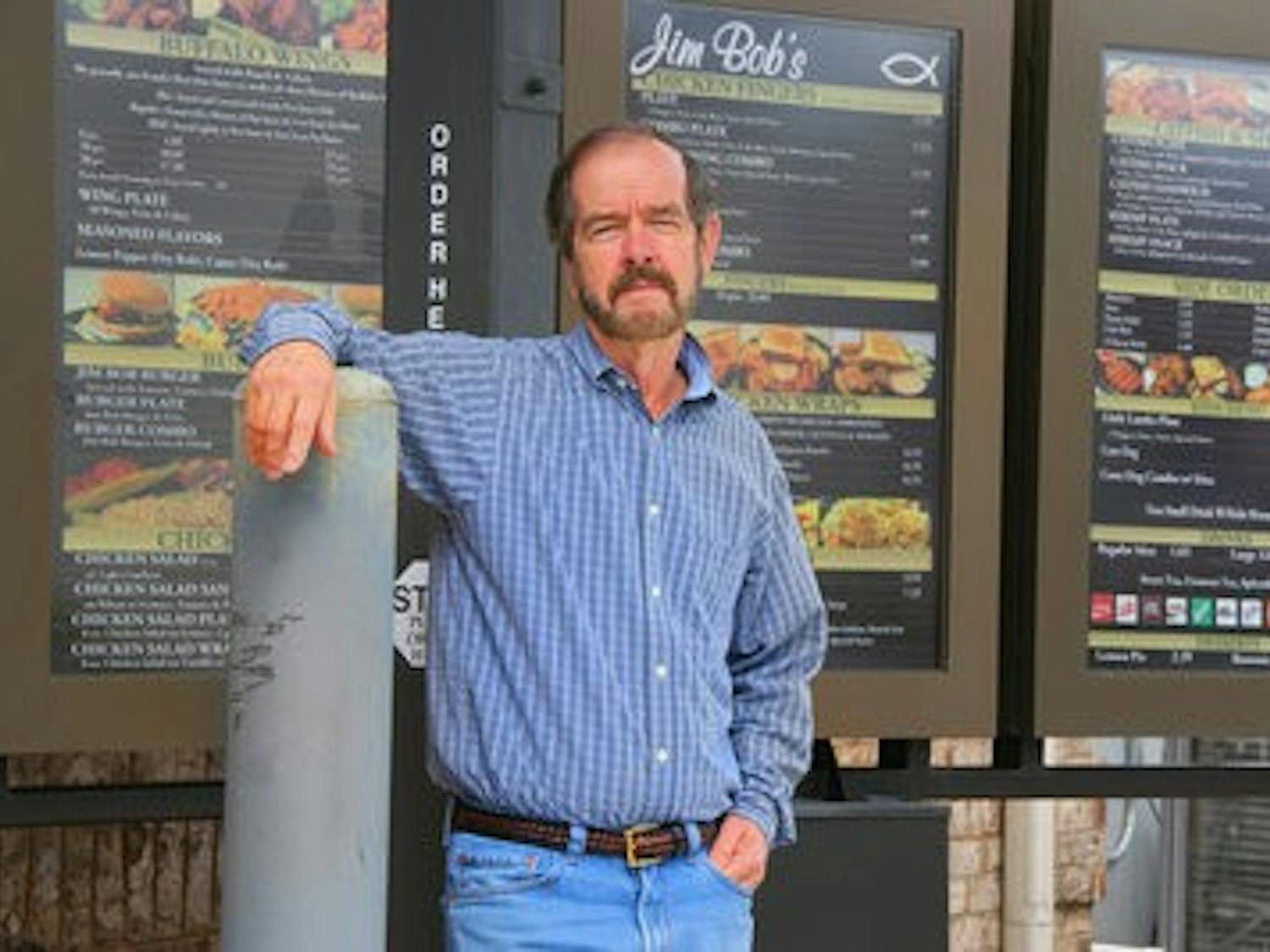 Owner of Jim Bob's, Chuck Ferrell, stands in front of the new drive-thru of the Tiger Town location. (Rebekah Weaver / Assistant Photo Editor)