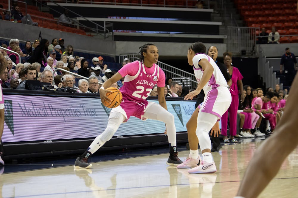 Honesty Scott-Grayson (#23) dribbles to set up a play versus Kentucky in Neville Arena on February 15th, 2024.