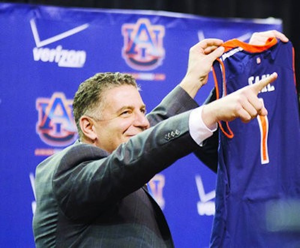 Bruce Pearl points to the student section during his introductory press conference at Auburn. (Raye May | DESIGN EDITOR)