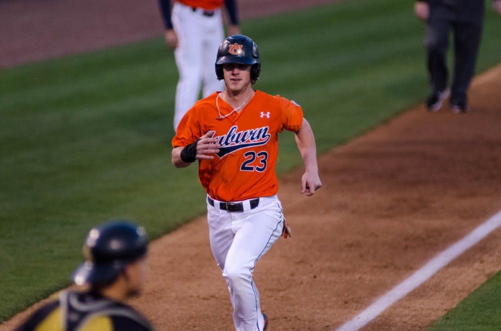 Jordan Ebert (23) jogs in to home plate during the Alabama State vs Auburn baseball game at Plainsman Park in Auburn, Ala., on Tuesday, March 23, 2016. Auburn defeated ASU 11-0.