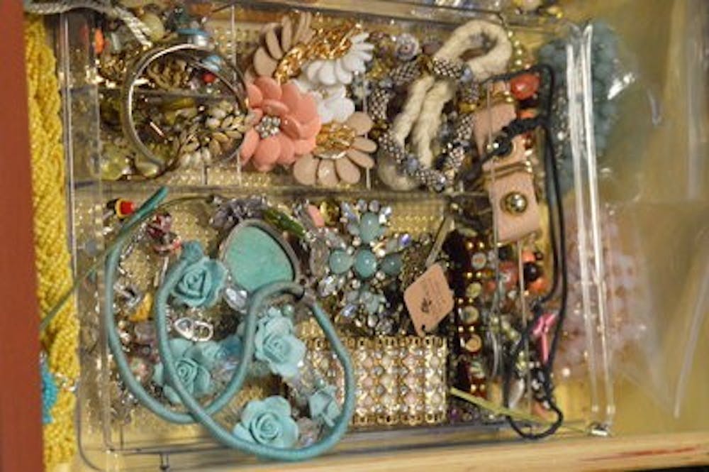 Clear trays placed in drawers can help keep jewelry organized and untangled. (Emily Enfinger | Photo Editor)
