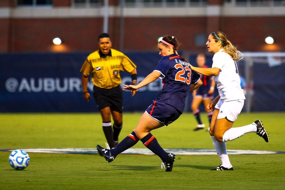 Brooke Ramsier passing the ball to her teammate.  (Kenny Moss | Photographer)