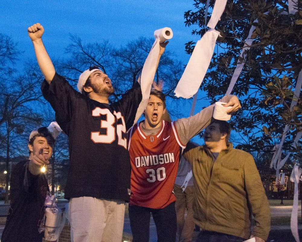 Auburn basketball fans roll Toomer's Corner after Auburn's victory over Kentucky at the Auburn Arena on Saturday, Jan. 16, in Auburn, Ala. Auburn won 75-70. 
