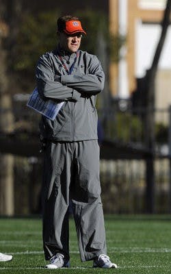 Gus Malzahn watches as his Tigers take the field for the first practice under the new head coach. (COURTESY OF TODD VAN EMST)