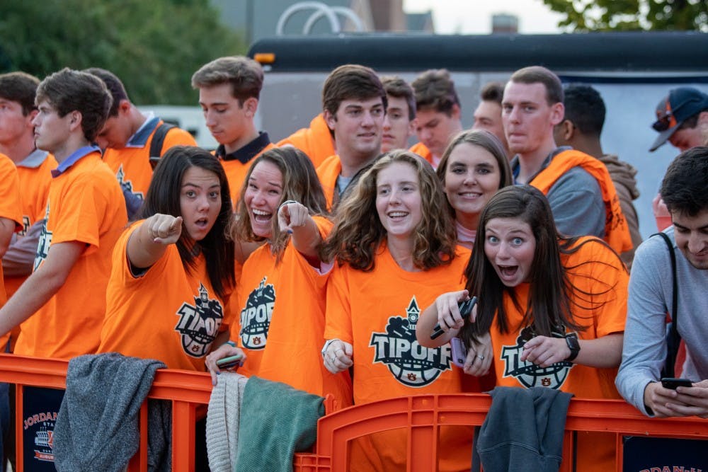 Fans pose for a photo during Tipoff at Toomer's, on Thursday, Oct. 17, 2019, in Auburn, Ala.