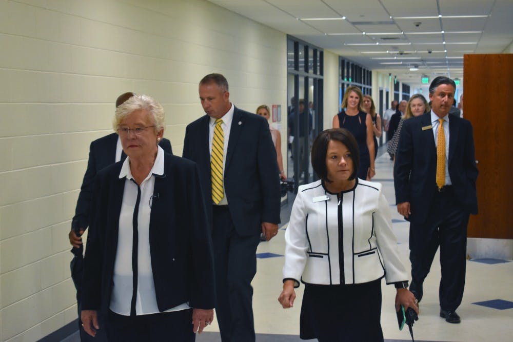Gov. Kay Ivey tours the new Auburn High School building with Principal Shannon Pignato on July 25, 2017, in Auburn, Ala.
