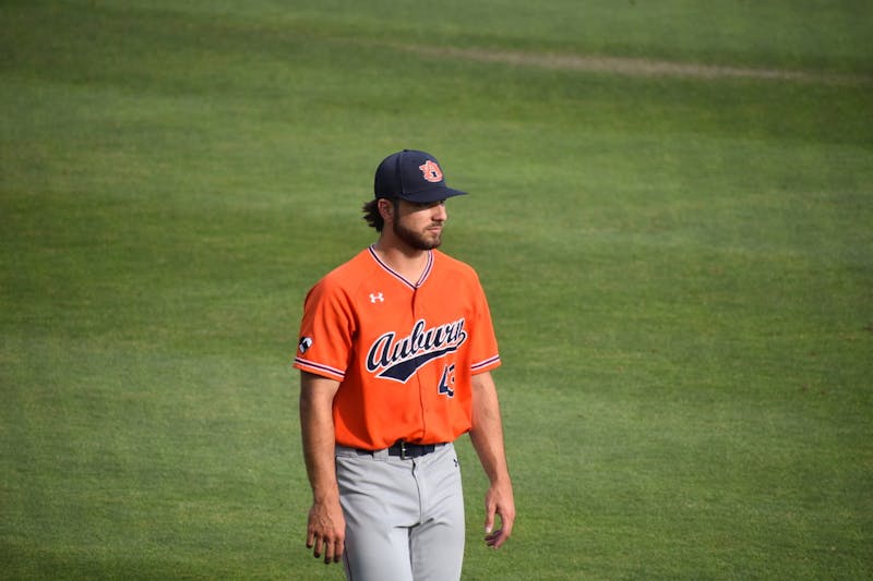 Chase Isbell heads to the dugout during Auburn's Regional game against Florida State.